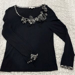 Great feel sweater with darling details